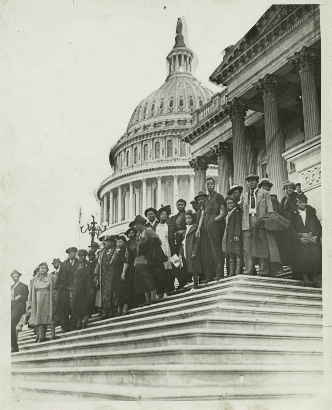 Members of the Peace Movement of Ethiopia on the steps of the United States Capitol, original photograph