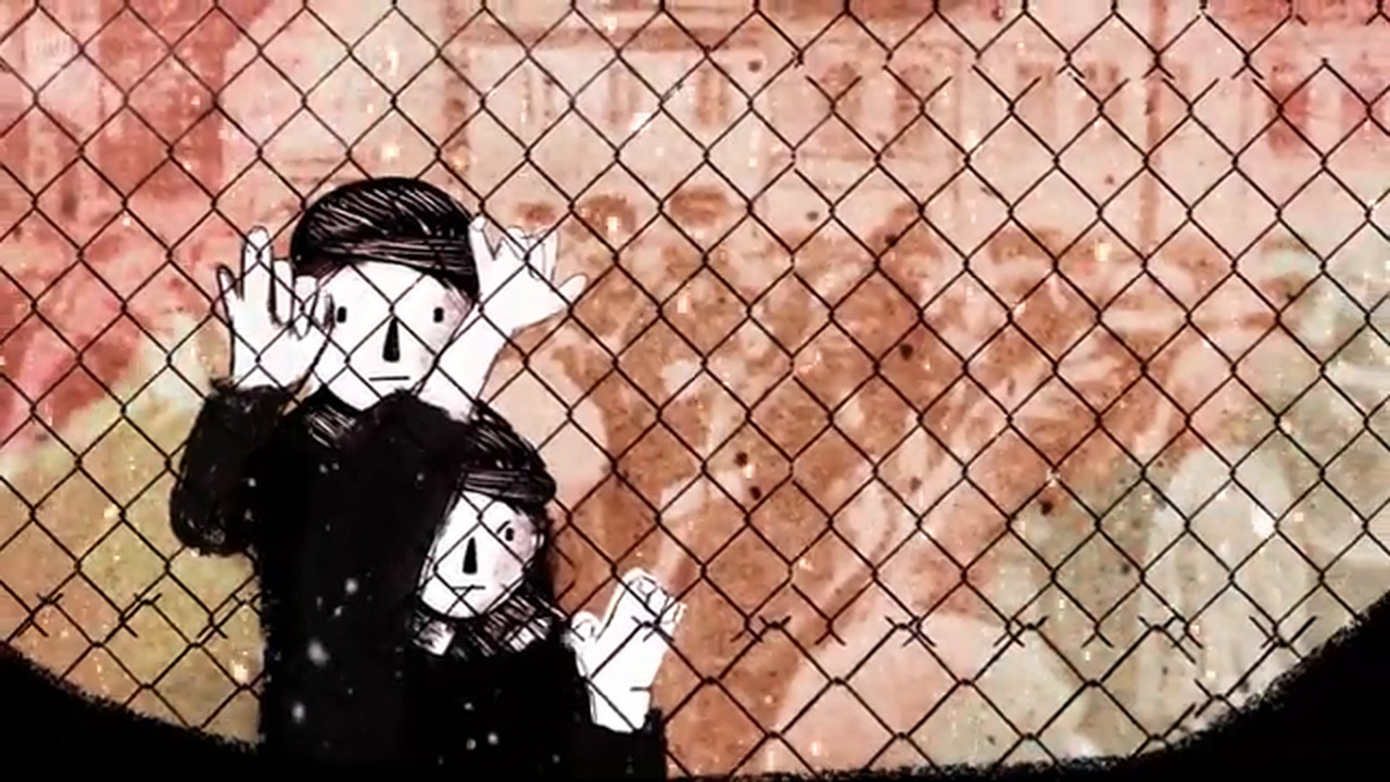Film still: two boys at a wire fence, the older one holding the younger close