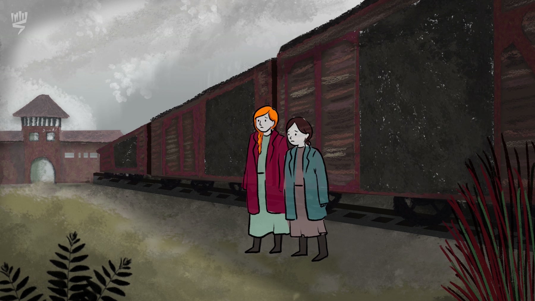 Film still: two sisters standing together beside a freight train, the camp gate behind them